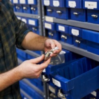 Carefully picking parts to ship to a happy customer.